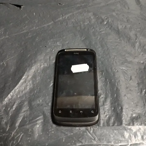 HTC SMARTPHONE – BLACK, ORANGE BRANDING ON BACK 