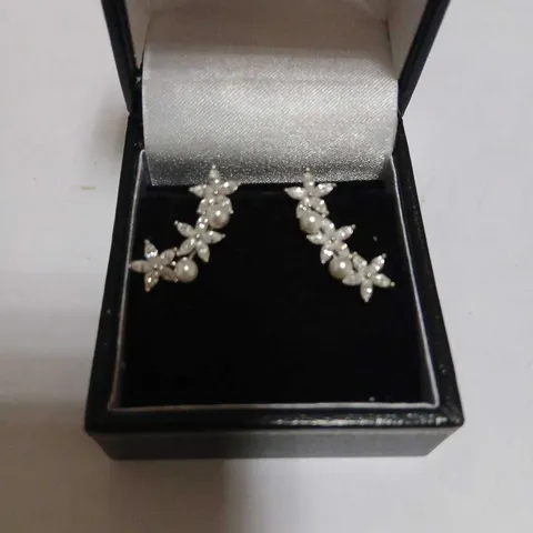 DIAMONIQUE STAR EARRINGS STERLING SILVER