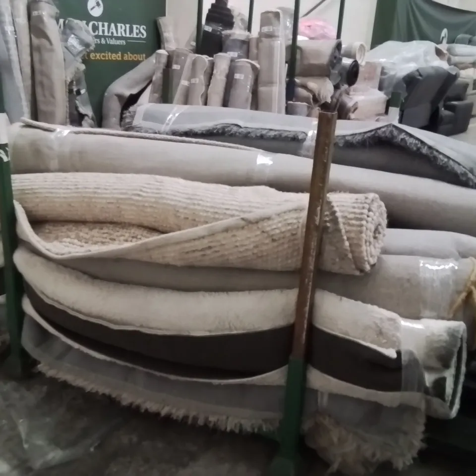 STILLAGE OF APPROXIMATELY 15 QUALITY DESIGNER RUGS
