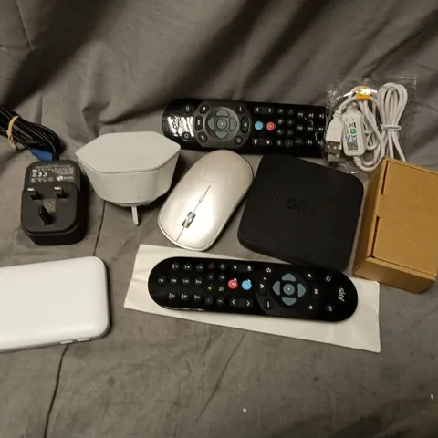 APPROXIMATELY 15 ASSORTED HOUSEHOLD ITEMS TO INCLUDE ROUTERS, TV REMOTE, MOUSE, ETC