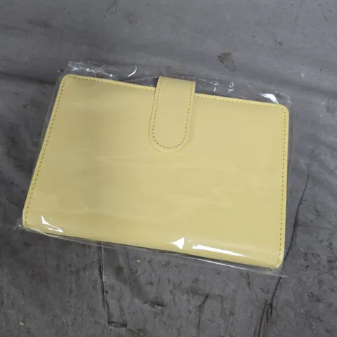 APPROXIMATELY 10 A5 BINDERS IN VARIOUS DESIGNS 