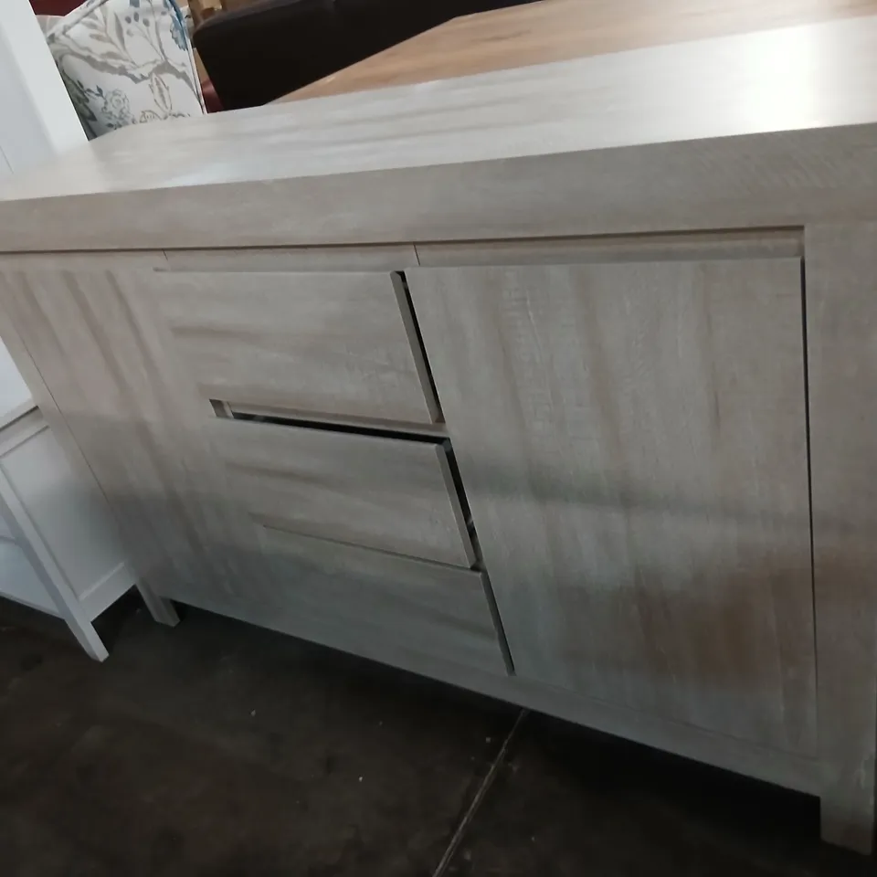 ELLANI CUBBOT WIDE TWO DOOR THREE DRAWER DUSTY GREY OAK SIDEBOARD