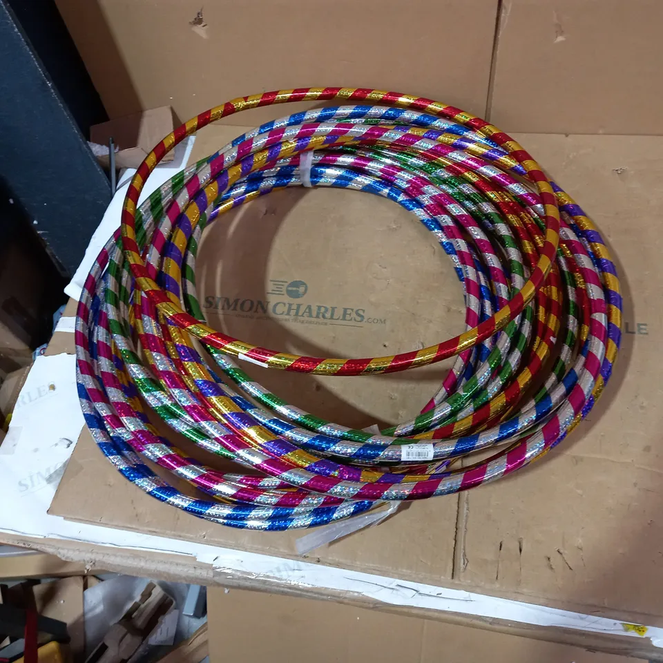 LOT OF APPROXIMATELY 16 ASSORTED DESIGNER HULA HOOPS