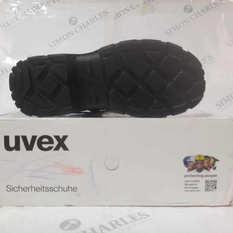 BOXED PAIR OF UVEX BOOTS IN BLACK EU SIZE 39