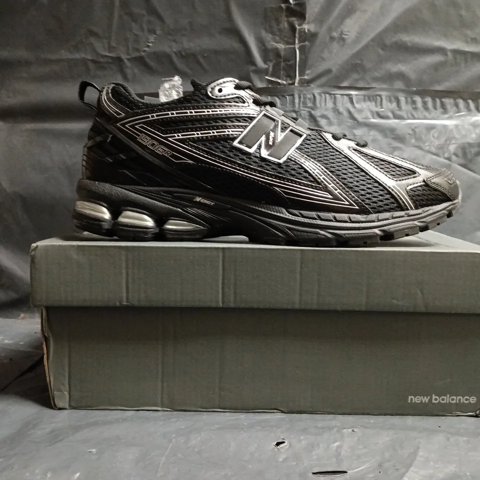 BOXED PAIR OF NEW BALANCE 1906R TRAINERS IN BLACK SIZE UK 10