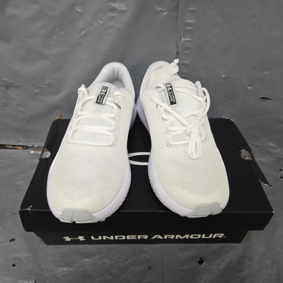 BOXED PAIR OF UNDER ARMOUR CHARGED SURGE 4 TRAINERS IN WHITE - UK 10