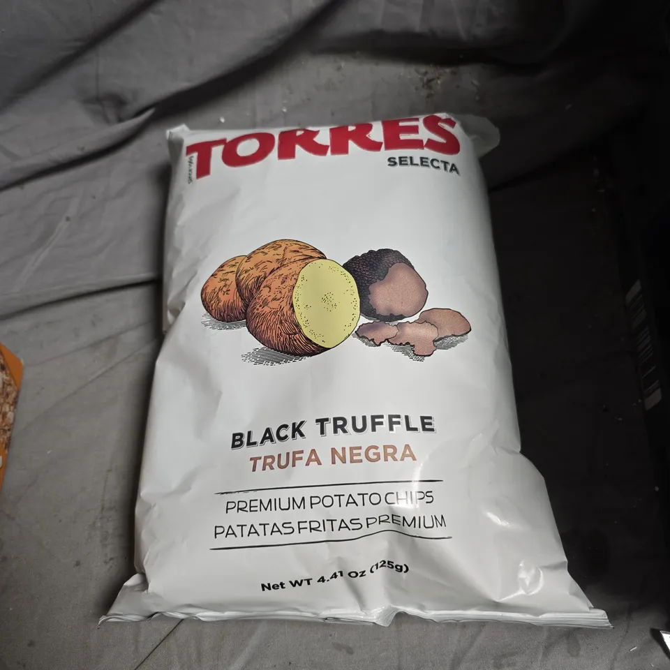 APPROXIMATELY 12 ASSORTED FOOD ITEMS INCLUDING SPICY BEEF JERKY , TORRES BLACK TRUFFLE CHIPS AND APRICOT & COCONUT OAT BARS