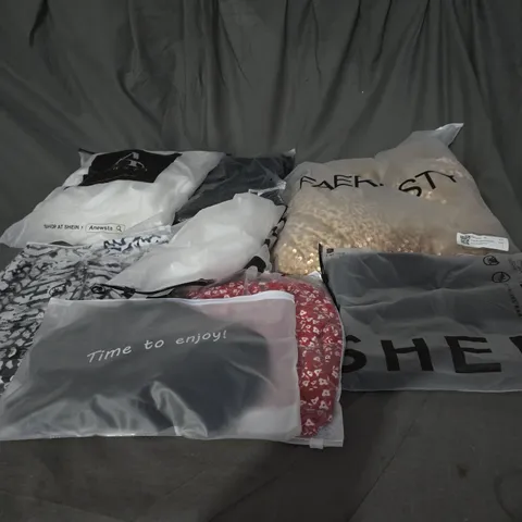 LARGE BOX OF ASSORTED CLOTHING ITEMS IN VARIOUS COLOURS, SIZES AND STYLES