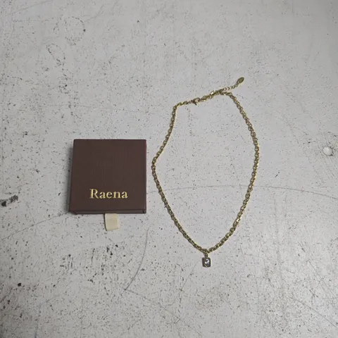 RAENA ZARIA NECKLACE – WHITE GEMSTONE PENDANT ON GOLD-TONE CHAIN