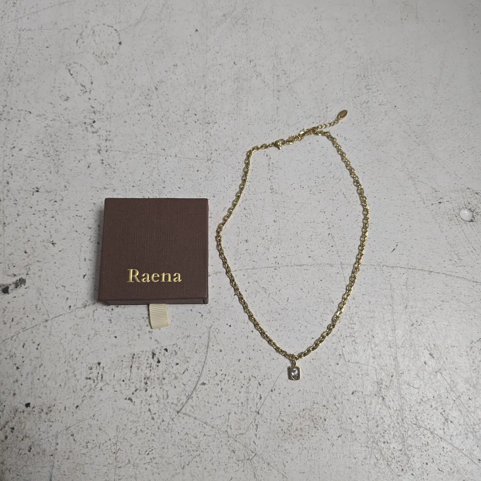 RAENA ZARIA NECKLACE – WHITE GEMSTONE PENDANT ON GOLD-TONE CHAIN