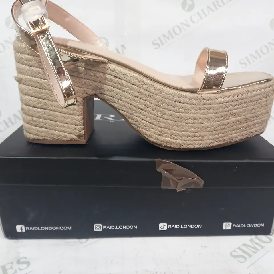 BOXED PAIR OF RAID WIDE FIT REMINGTON PLATFORM SANDALS IN METALLIC GOLD UK SIZE 9