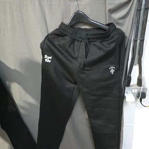 BOX OF APPROXIMATELY 25 CLOTHING ITEMS INCLUDING:BREAK THE RULES TRACKSUIT BOTTOMS, JUMPER AND GREY HOODIE