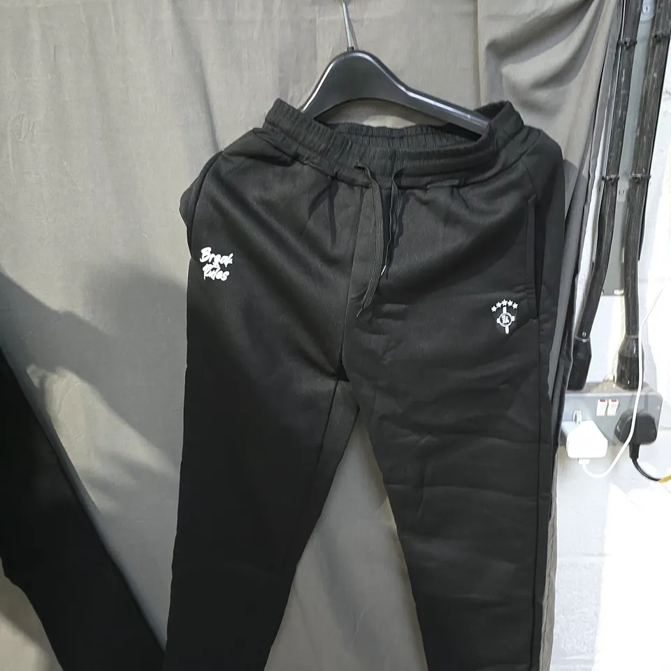 BOX OF APPROXIMATELY 25 CLOTHING ITEMS INCLUDING:BREAK THE RULES TRACKSUIT BOTTOMS, JUMPER AND GREY HOODIE