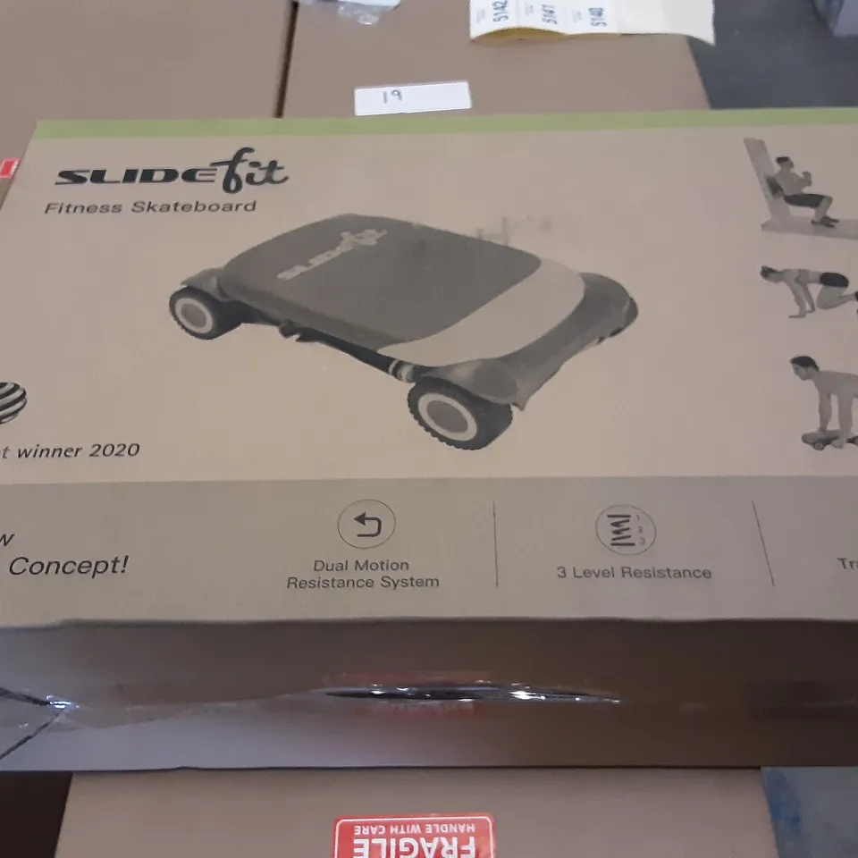 PALLET OF 8 BOXES OF KELLY HOPPEN TABLE LAMPS & 26 BOXES OF SLIDEFIT FITNESS SKATEBOARDS