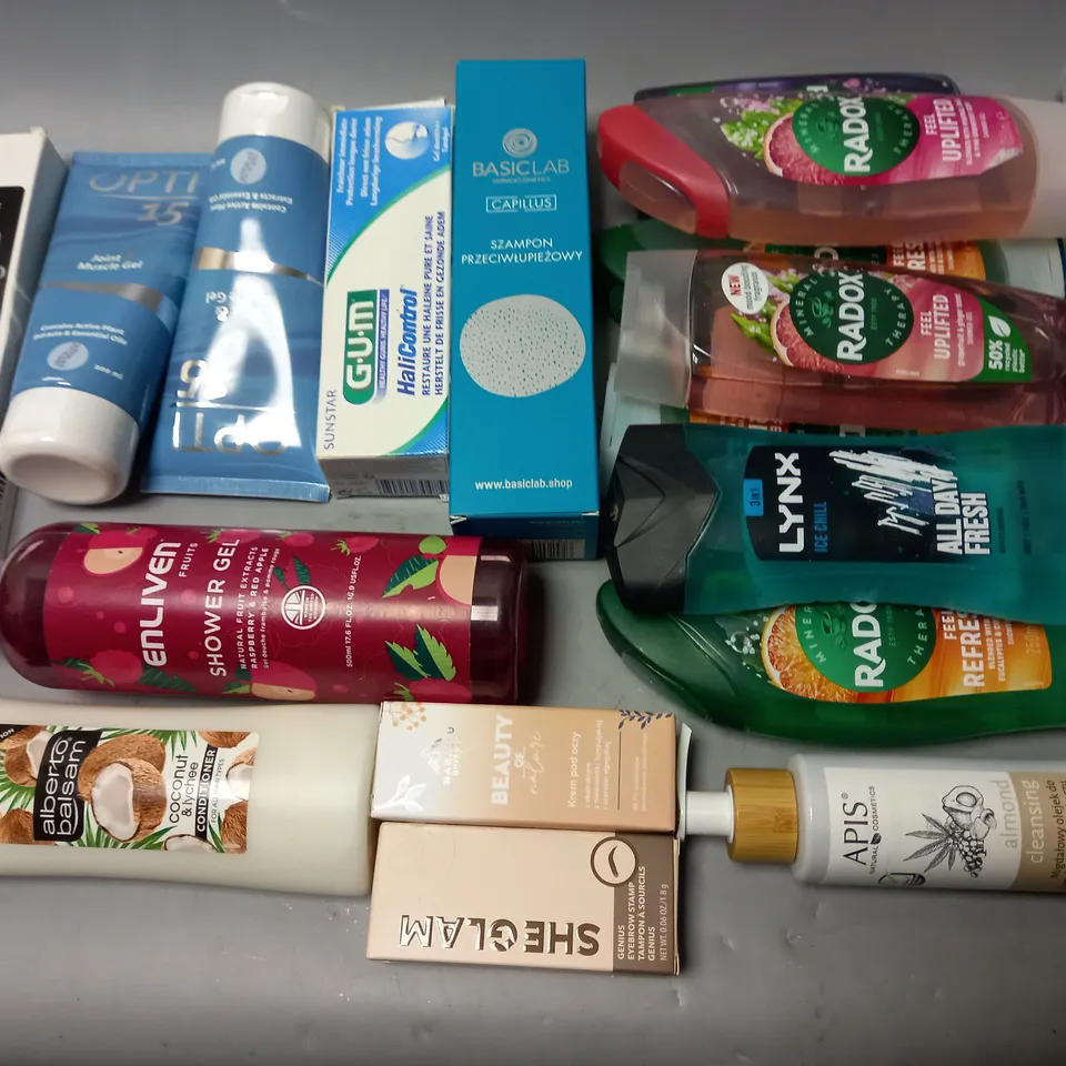 lot of approximately 18 assorted health and beauty items to include sonic electric toothbrush, apis almond oil and various shower gels