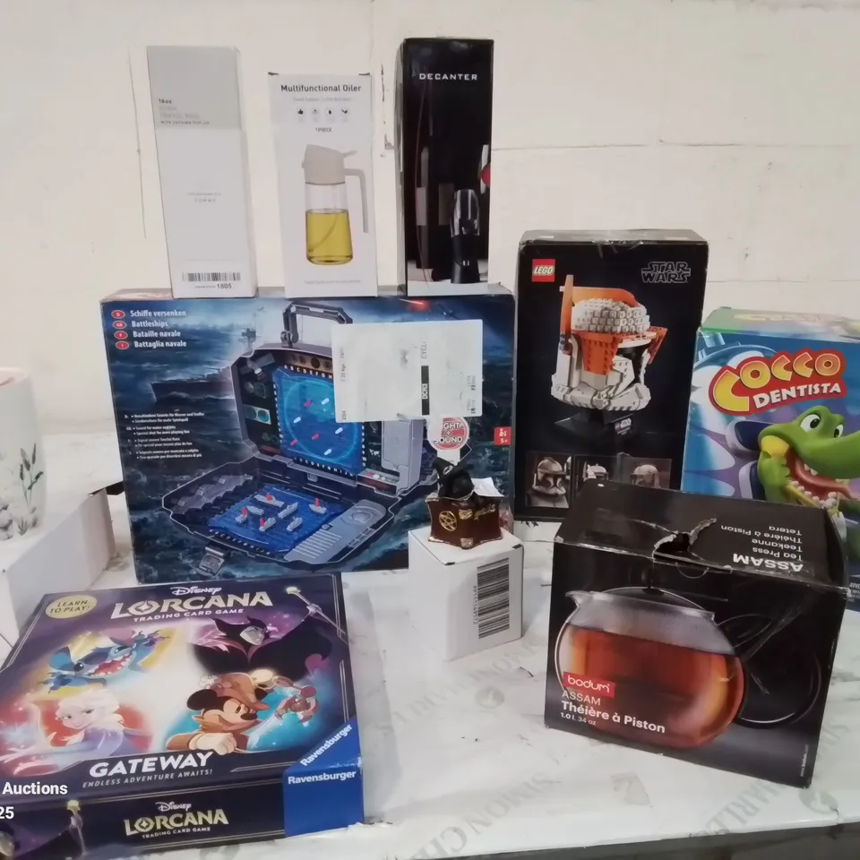 BOX CONTAINING APPROXIMATELY 10 TOYS AND OTHER ITEMS TO INCLUDE:MULTIFUNCTIONAL OILER, TRAVEL MUG, DECANTER, LORCANA GAME, STAR WARS HELMET, COCCO DENTIST ETC.