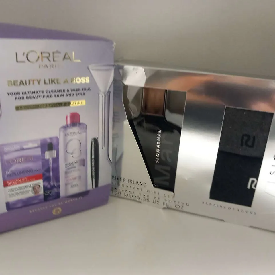 THREE ASSORTED COSMETICS GIFT SETS TO INCLUDE; L'OREAL PARIS BEAUTY LIKE A BOSS AND RIVER ISLAND SIGNATURE GIFT SET
