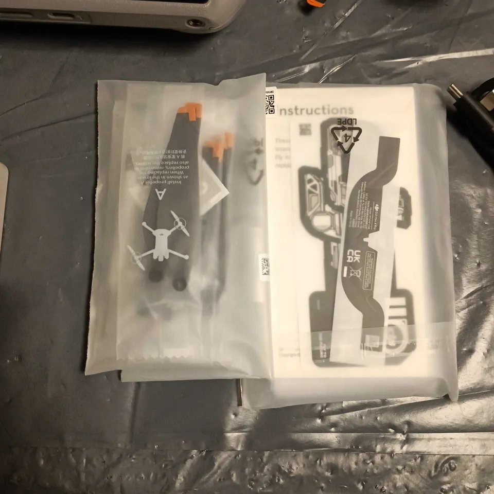 DJI Drone kit with integrated-screen controller, batteries & charger – carry case