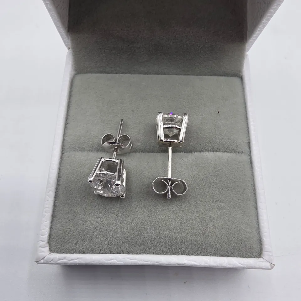 18CT WHITE GOLD STUD EARRINGS SET WITH NATURAL DIAMONDS WEIGHING +-3.01CT