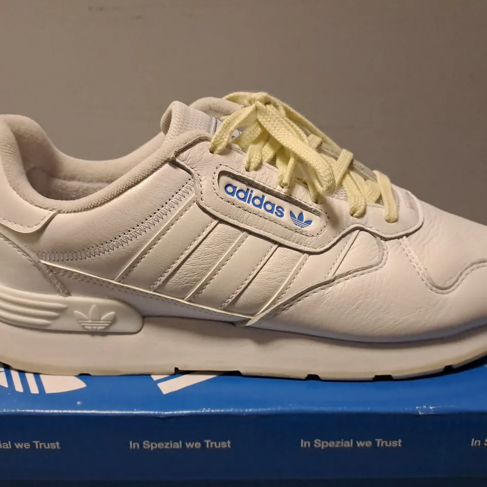 ADIDAS WHITE TRAINERS WITH YELLOW LACES - 9 1/2