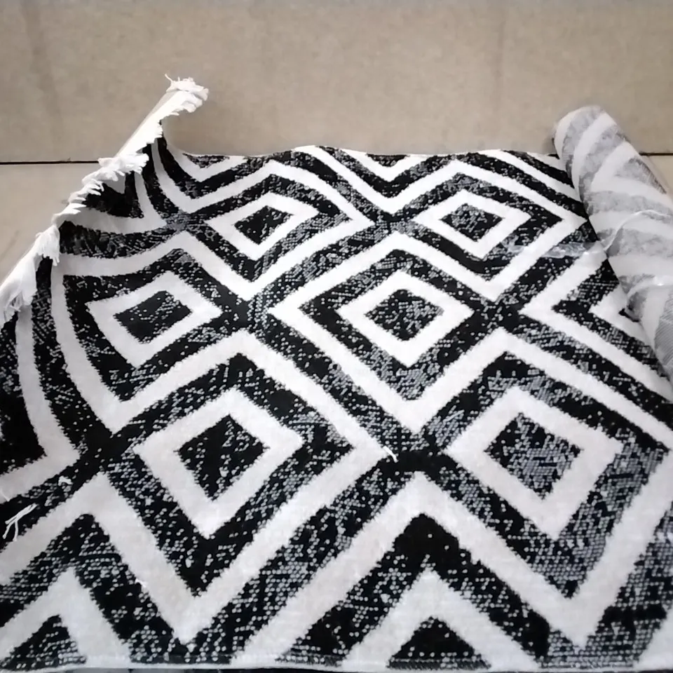 BRAND NEW PACO HOME BLACK-WHITE POCO RUG SIZE 80CM X 150CM