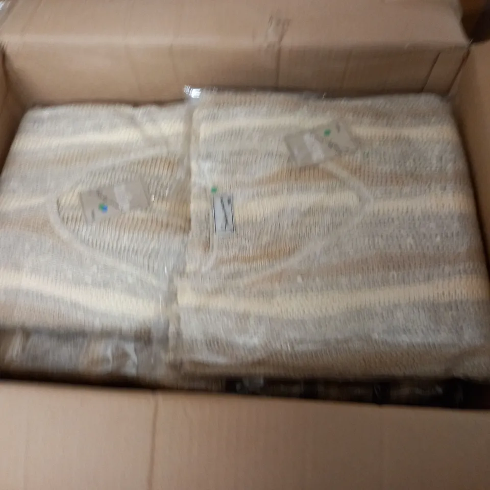 LOT OF APPROXIMATELY 15 V-NECK JUMPERS IN NATURAL - SIZE UNSPECIFIED