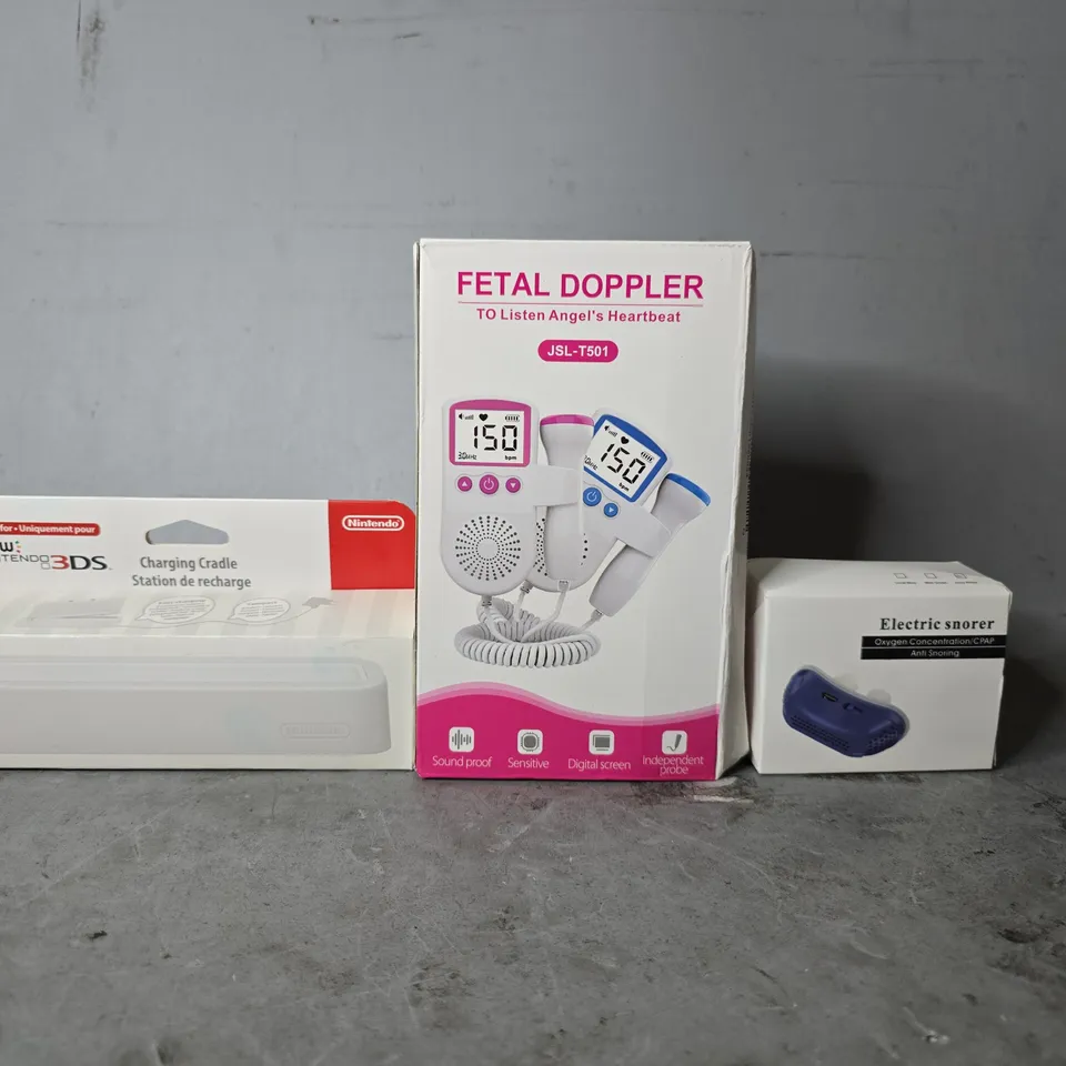 APPROXIMATELY 8 ASSORTED ITEMS TO INCLUDE - FETAL DOPPLER , ELECTRIC SNORER  , NINTENDO 3DS CHARGING CRADLE ETC