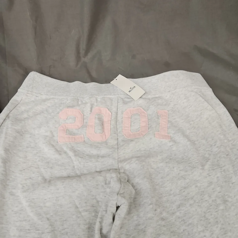 HOLLISTER GREY SWEATPANTS WITH PINK '2001' EMBLEM – XL