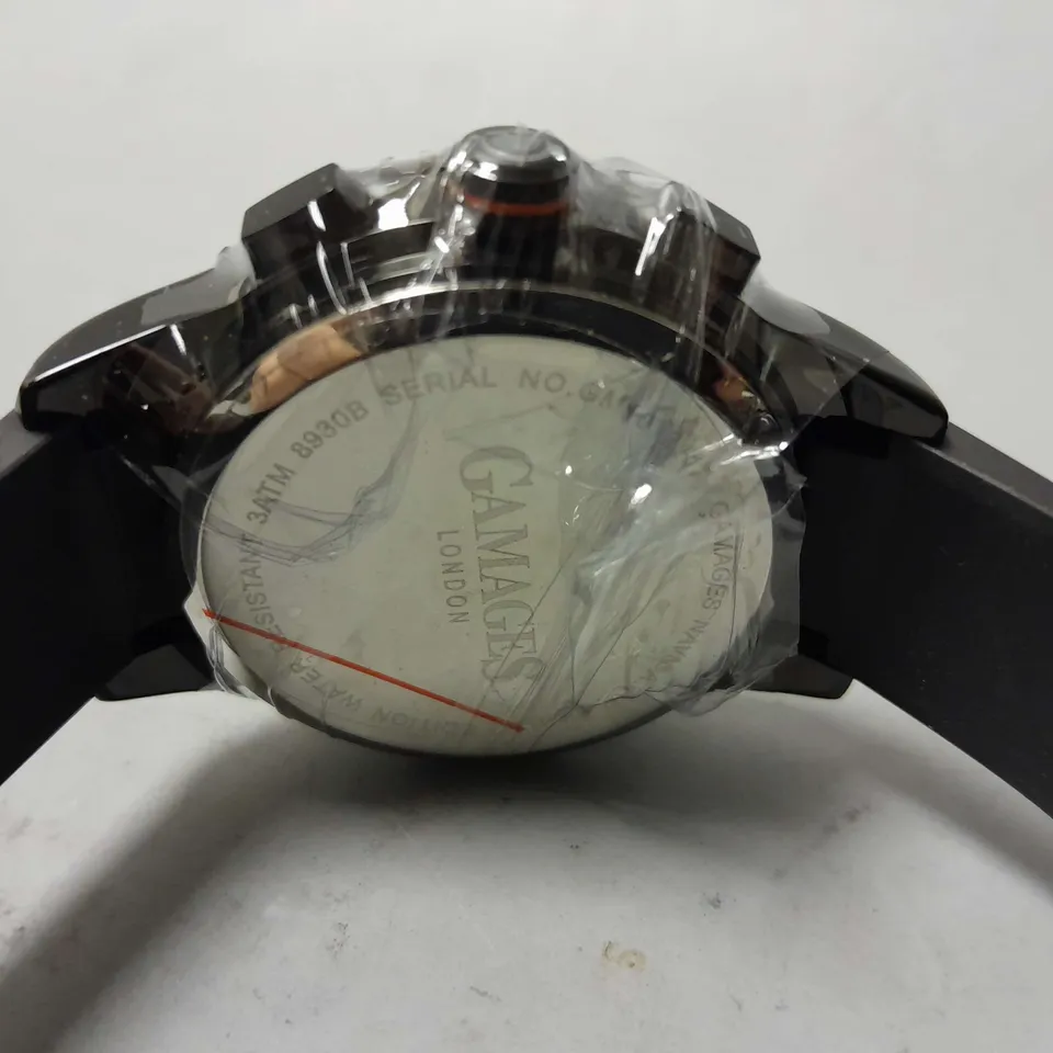 BOXED GAMAGES LONDON NAVIGATOR WATCH IN BLACK/ORANGE