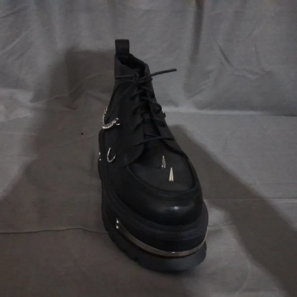 PAIR OF KOI LACE UP BOOTS IN BLACK SIZE 6