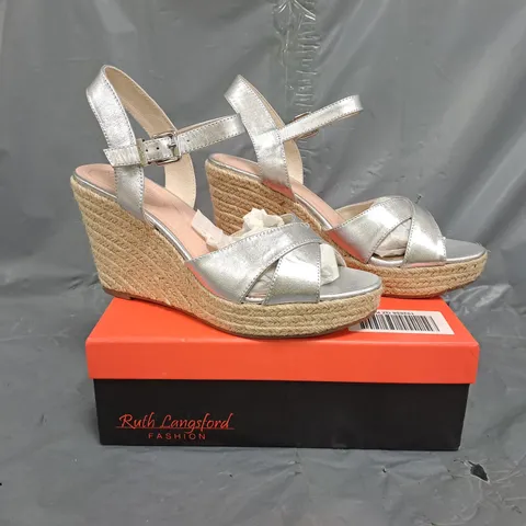 BOXED PAIR OF RUTH LANGSFORD WEDGE SANDALS IN SILVER SIZE 8