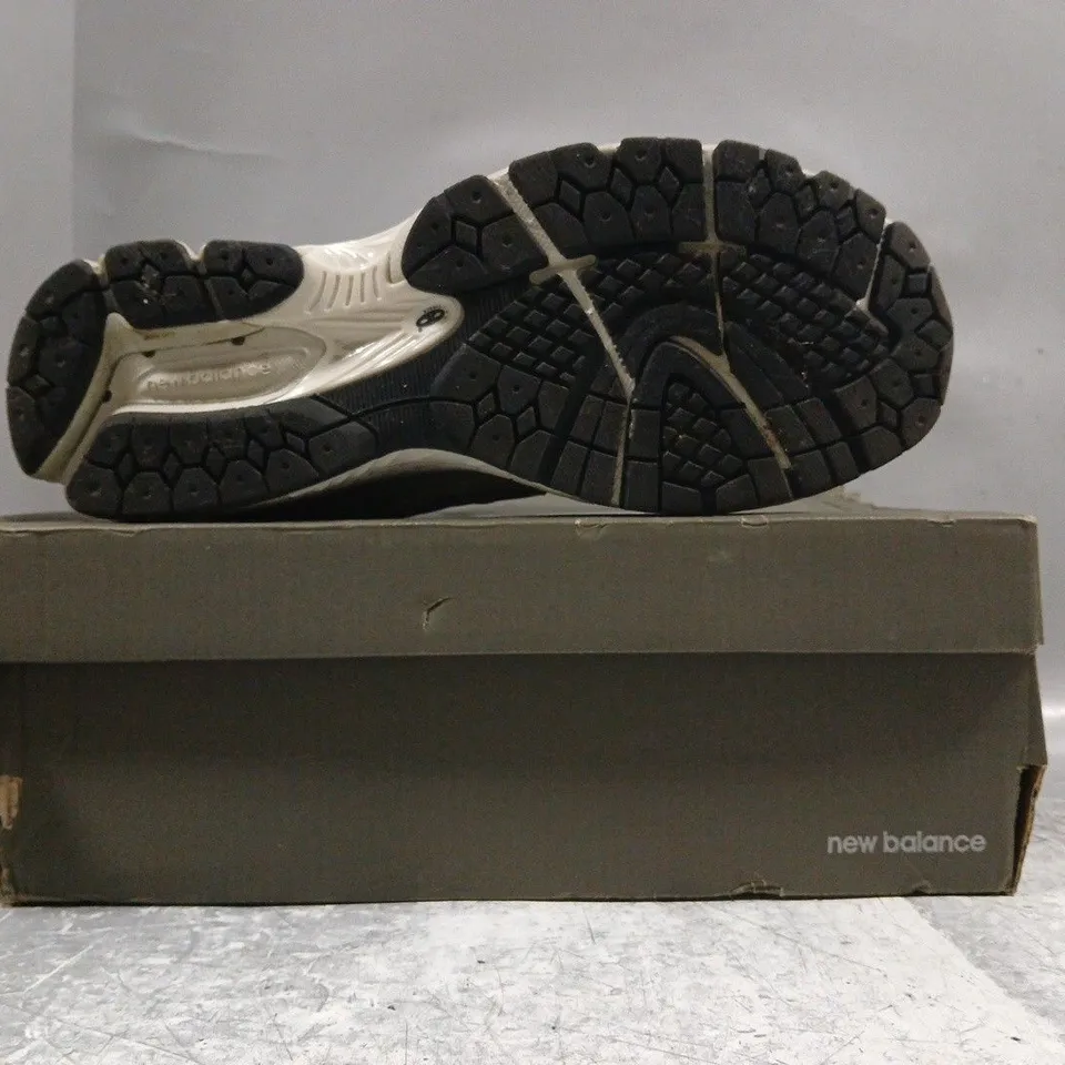 BOXED PAIR OF NEW BALANCE 2002R SHOES IN STONE/GREY SIZE UK 10.5