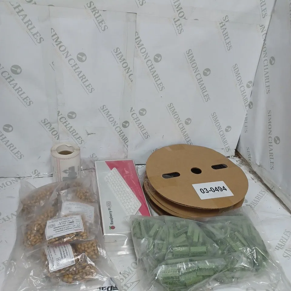 LARGE BOX OF ASSORTED ITEMS TOO INCLUDE HEAT WIRE , WALL PLUGS , KEYBOARDS , ETC - COLLECTION ONLY