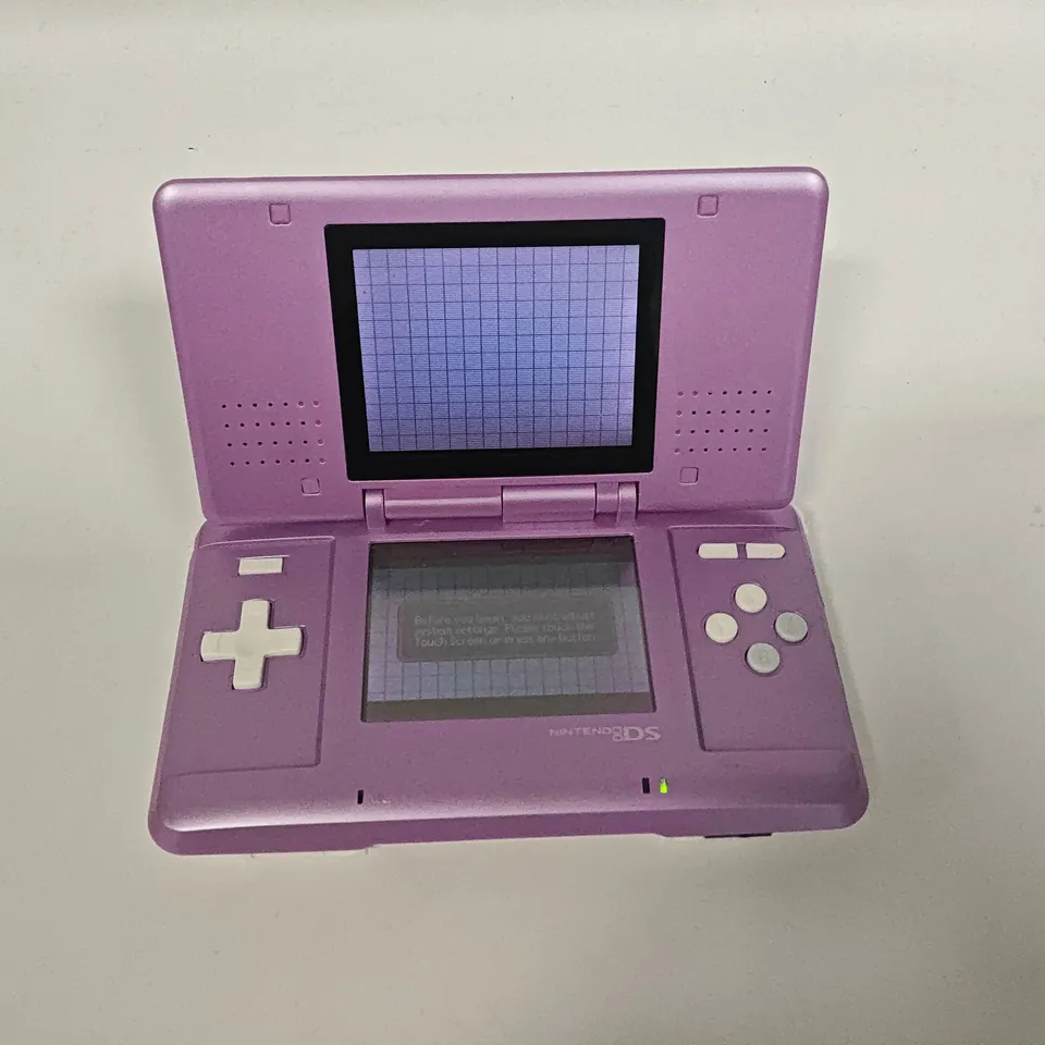 UNBOXED NINTENDO DS IN PURPLE/WHITE WITH SPYRO ADVENTURE - NTR-001
