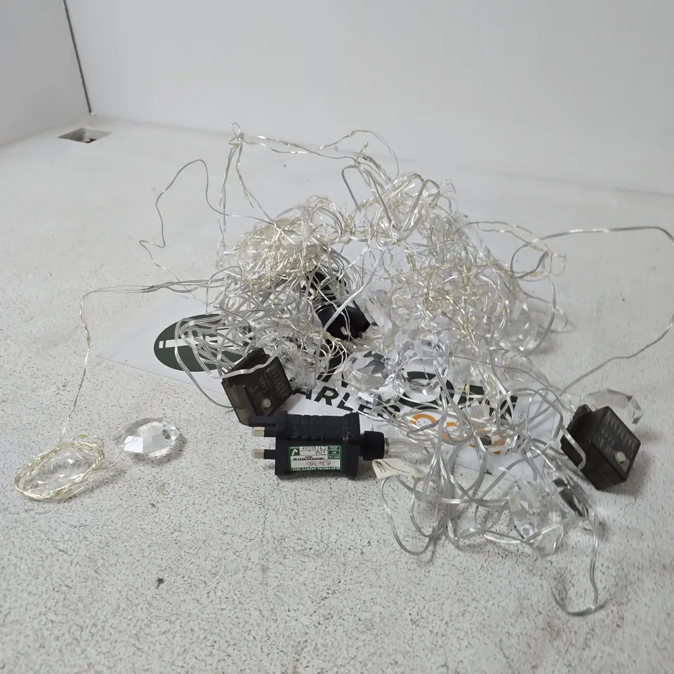 BOX OF APPROXIMATELY 10 ASSORTED ITEMS INCLUDING STRING LIGHTS AND TYRE INFLATOR