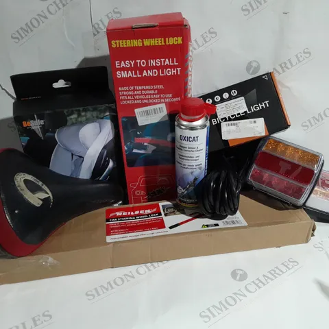 APPROXIMATELY 20 ASSORTED ITEMS TO INCLUDE CAR STEERING WHEEL LOCK, BIKE SEAT, BIKE LIGHT, CHILD SEAT COVER, OXICAT OXYGEN SENSOR AND CATALYTIC CONVERTER CLEANER ETC. 