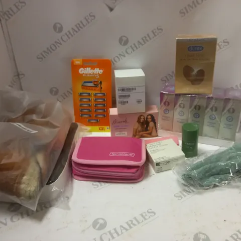 LOT OF ASSORTED COSMETIC ITEMS CONDOMS, GRIP CLIPS AND GILLETTE RAZOR HEADS