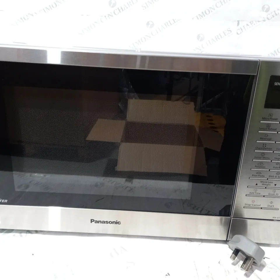 BOXED PANASONIC NN-ST48KS MICROWAVE OVER