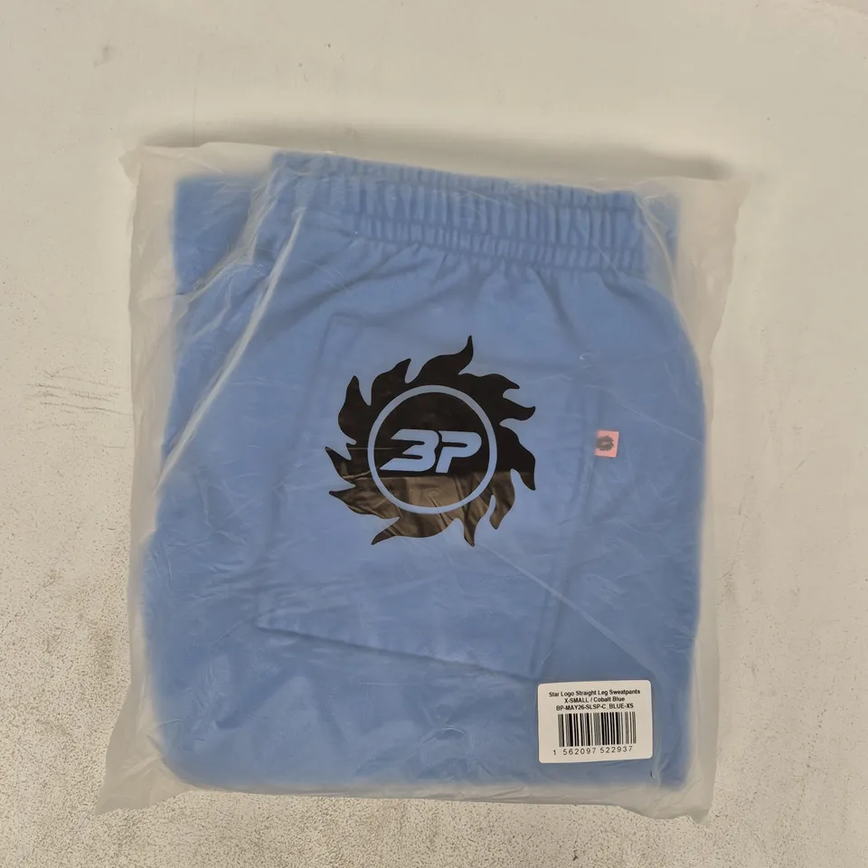 BAGGED BROKEN PLANET STAR LOGO STRAIGHT LEG SWEATPANTS IN COBALT BLUE SIZE XS
