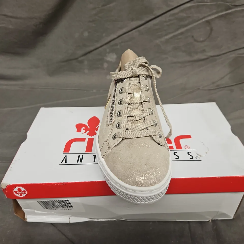 BOXED PAIR OF RIEKER TRAINERS IN METALLIC GOLD SIZE 38