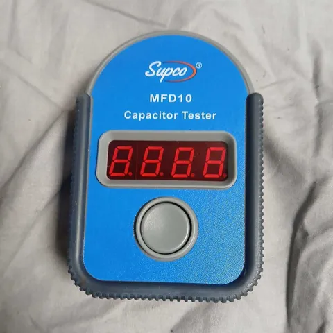 SUPCO MFD10 CAPACITOR TESTER – BLUE HANDHELD DEVICE WITH BLACK ZIP-CASE