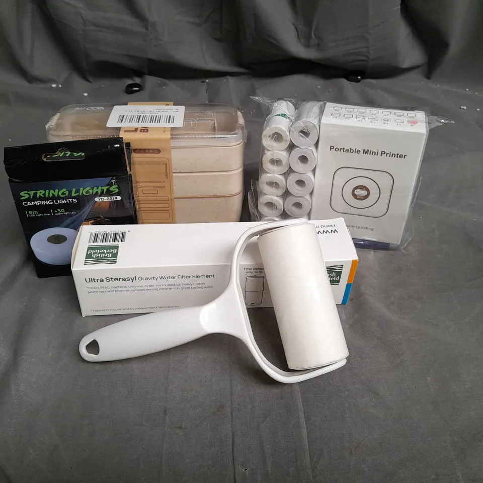 11 ASSORTED HOUSEHOLD ITEMS TO INCLUDE PORTABLE MINI PRINTER, DOULTON ULTRA STERASYL GRAVITY WATER FILTER ELEMENT, STRING LIGHTS (8M), ETC. 