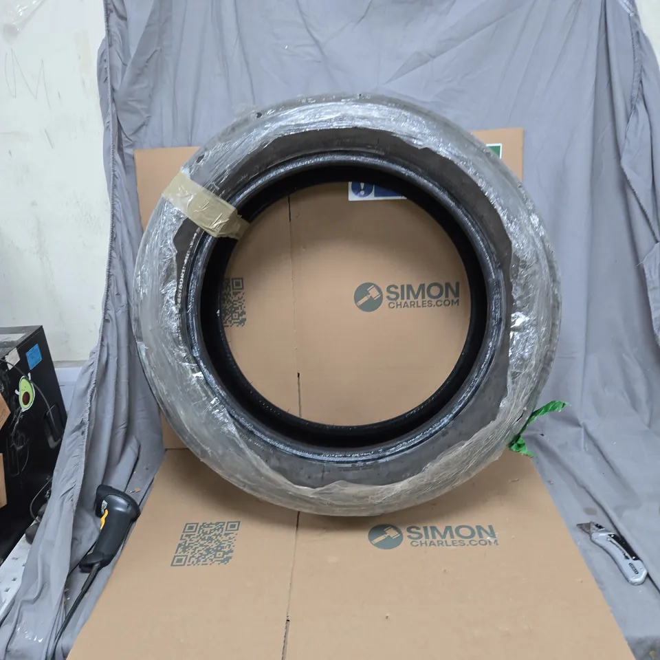 CAR TYRE  – WRAPPED IN PROTECTIVE PACKAGING 