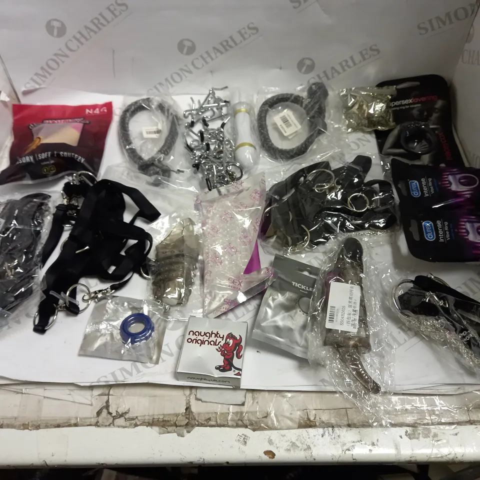 LOT OF APPROX 15 ASSORTED ADULT ITEMS TO INCLUDE VIBE RINGS, BONDAGE GEAR, COCK SLEEVES ETC