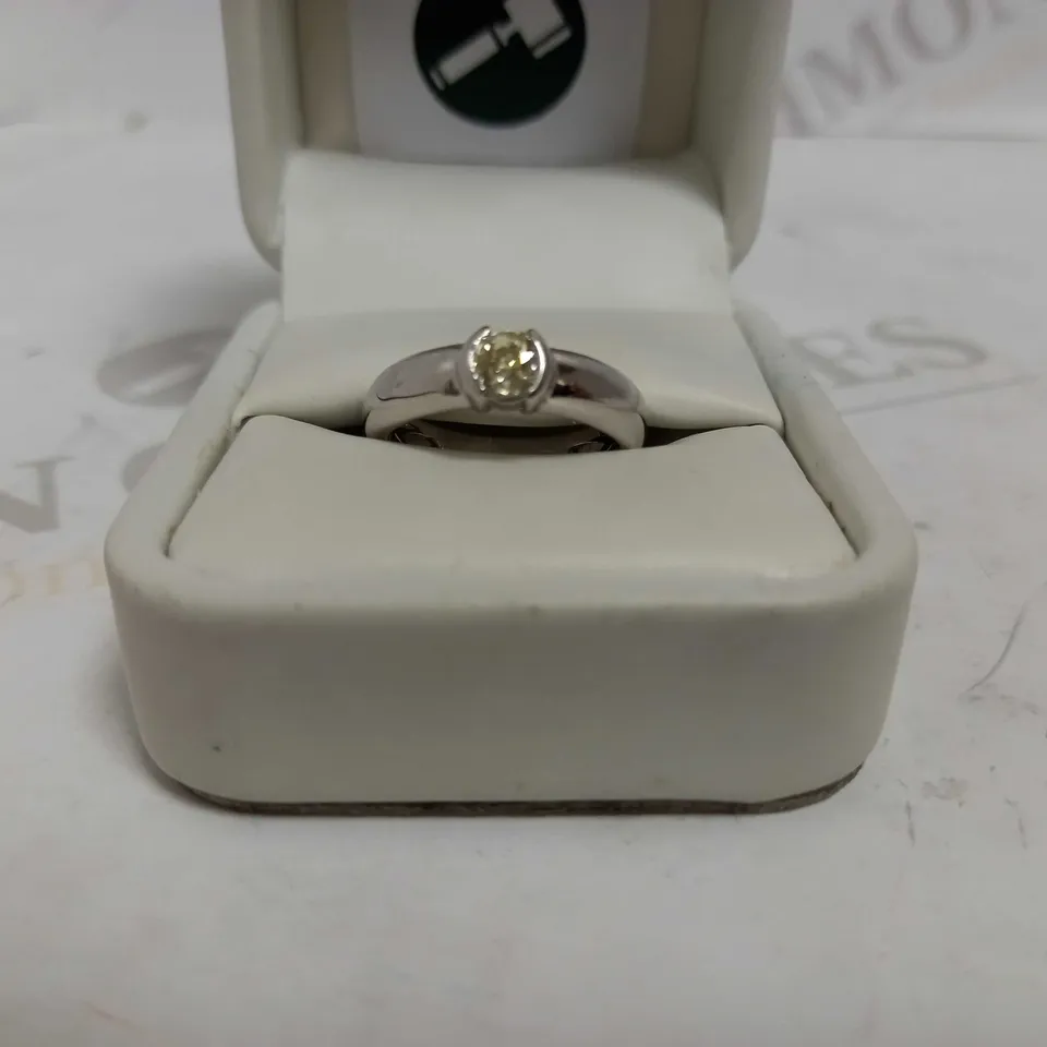 DESIGNER 18CT WHITE GOLD SOLITAIRE RING SET WITH AN OLD CUT DIAMOND WEIGHING +-0.52CT