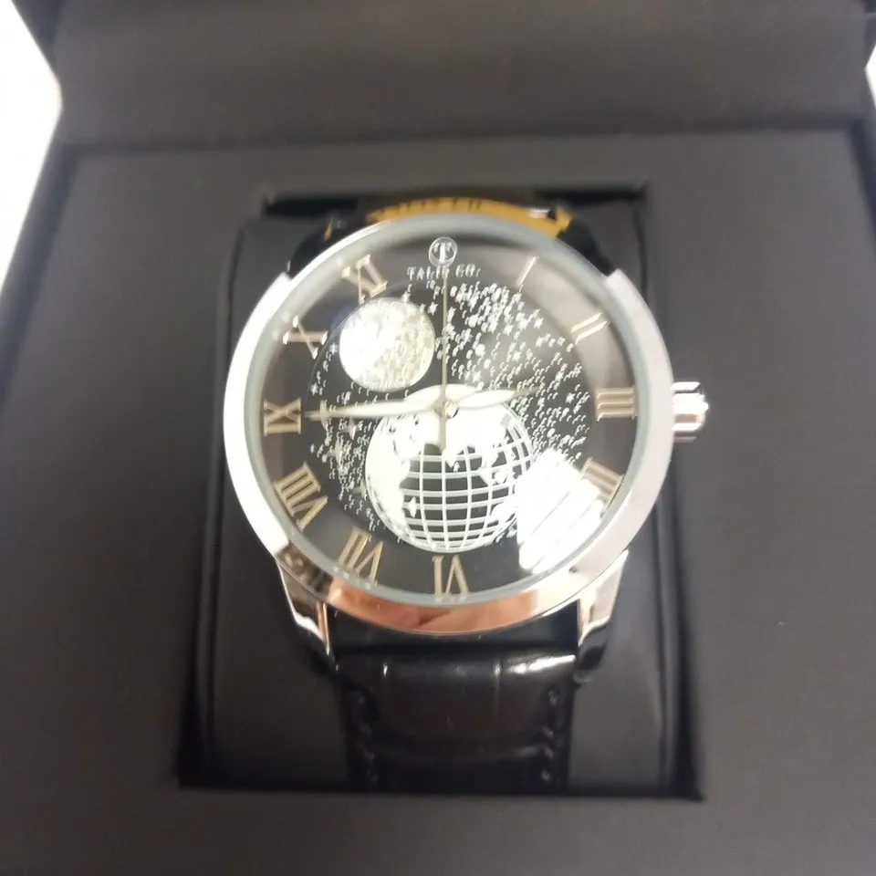MEN’S TALIS CO AUTOMATIC 8590 ASTRO WATCH – GLOBE/MOON DIAL LUMINOUS DETAILING – GLASS EXHIBITION BACK CASE– 3ATM WATER RESISTANT- LEATHER STRAP - £699