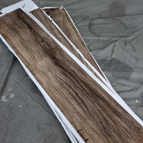 APPROXIMATELY 25 WOODEN EFFECT LAMINATE FLOORING TILES