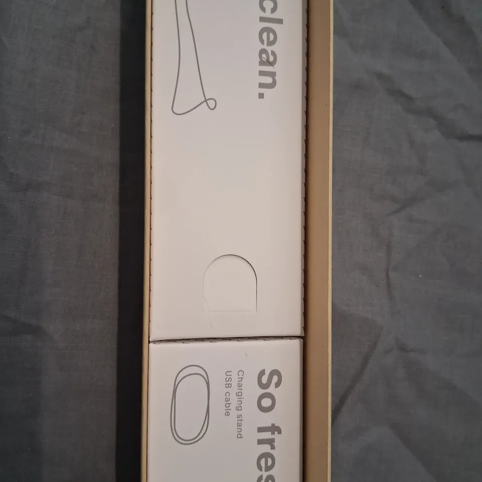 BOXED SURI SUSTAINABLE SONIC TOOTHBRUSH SUNSET BLOOM 