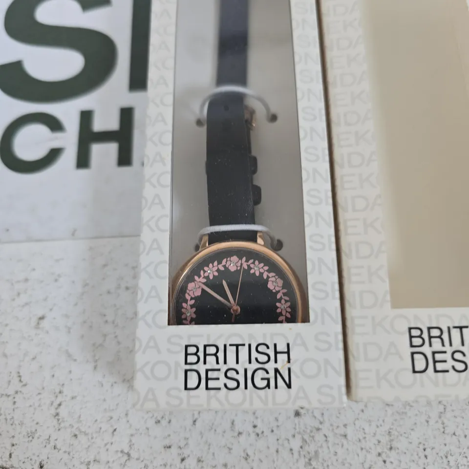 SEKONDA BRITISH DESIGN LADIES' WATCH – BLACK STRAP WITH PINK FLORAL DIAL, BOXED