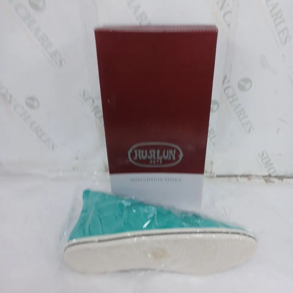 LARGE BOX OF APPROXIMATELY 10 BOXED HURLON GREEN HIGH TRAINERS IN VARIOUS SIZES 